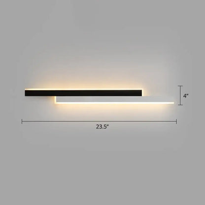 Modern black and white linear led wall light with two overlapping horizontal strips emitting warm ambient light for corridor
