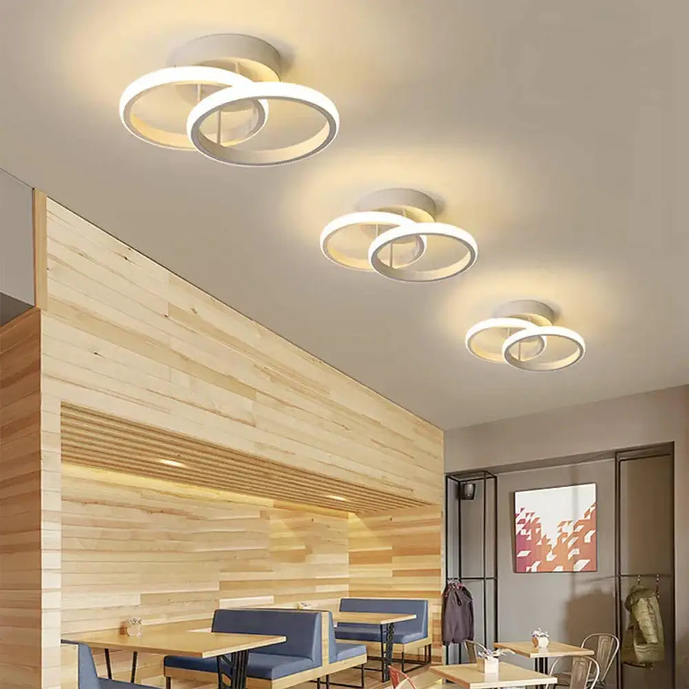 Modern black and white minimalist led ceiling light with sleek white circular decorbites led ceiling design for living room decor