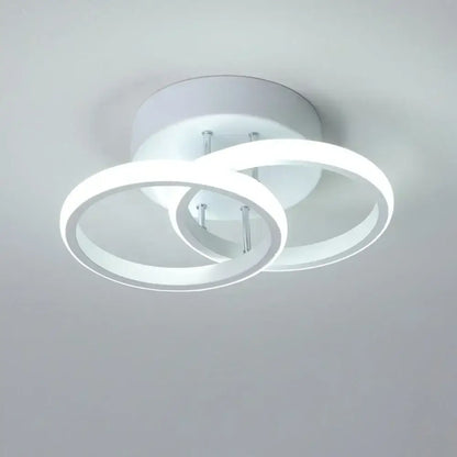 Modern black and white minimalist led ceiling light with interlocking circular rings for living room decorbites ceiling light