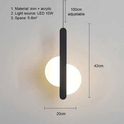 Modern black iron and acrylic pendant light with sleek vertical bar design featuring led bulbs as light source for dining room
