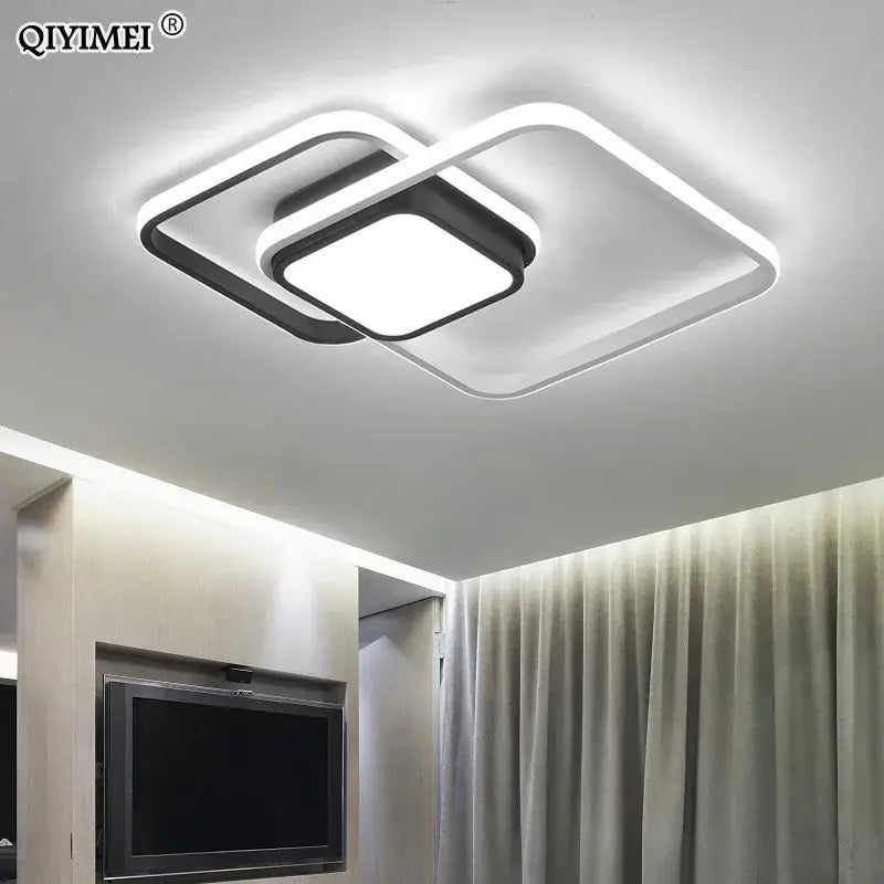 Modern black and white rectangular led ceiling light with sleek frame and overlapping geometric shapes for living room decorbites led ceiling