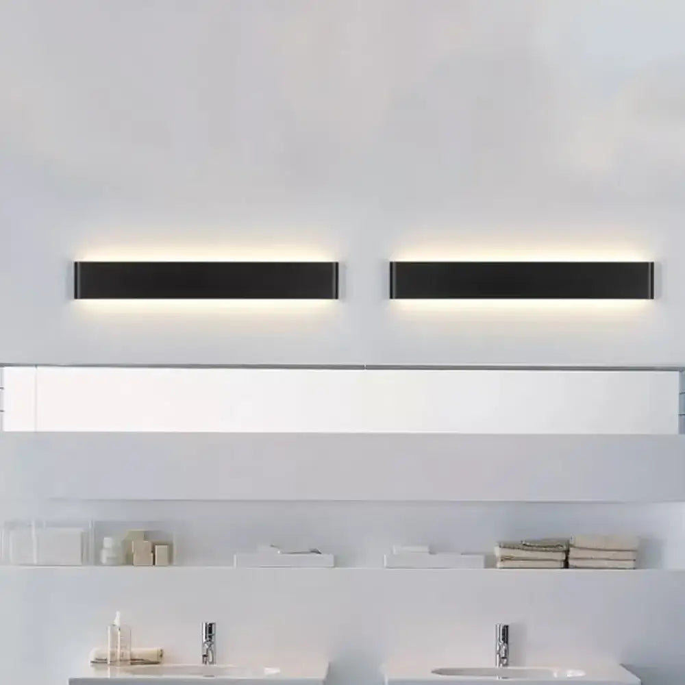 Two sleek black rectangular metal shade wall lamps with warm white light fixture for modern living room use