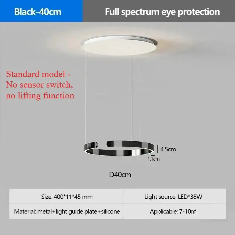 Modern black circular pendant light with sleek metal frame and silicone accents featuring led light source for eye protection