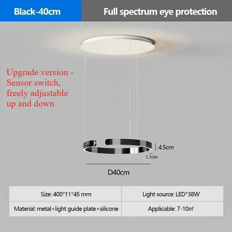 A sleek black circular pendant light with LED light source and adjustable cables for modern dining room use