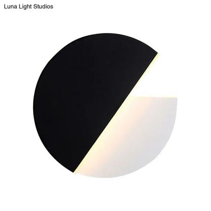 Modern black and white rotatable acrylic wall lamp with a sleek half-circle design for bedroom use wall lamp