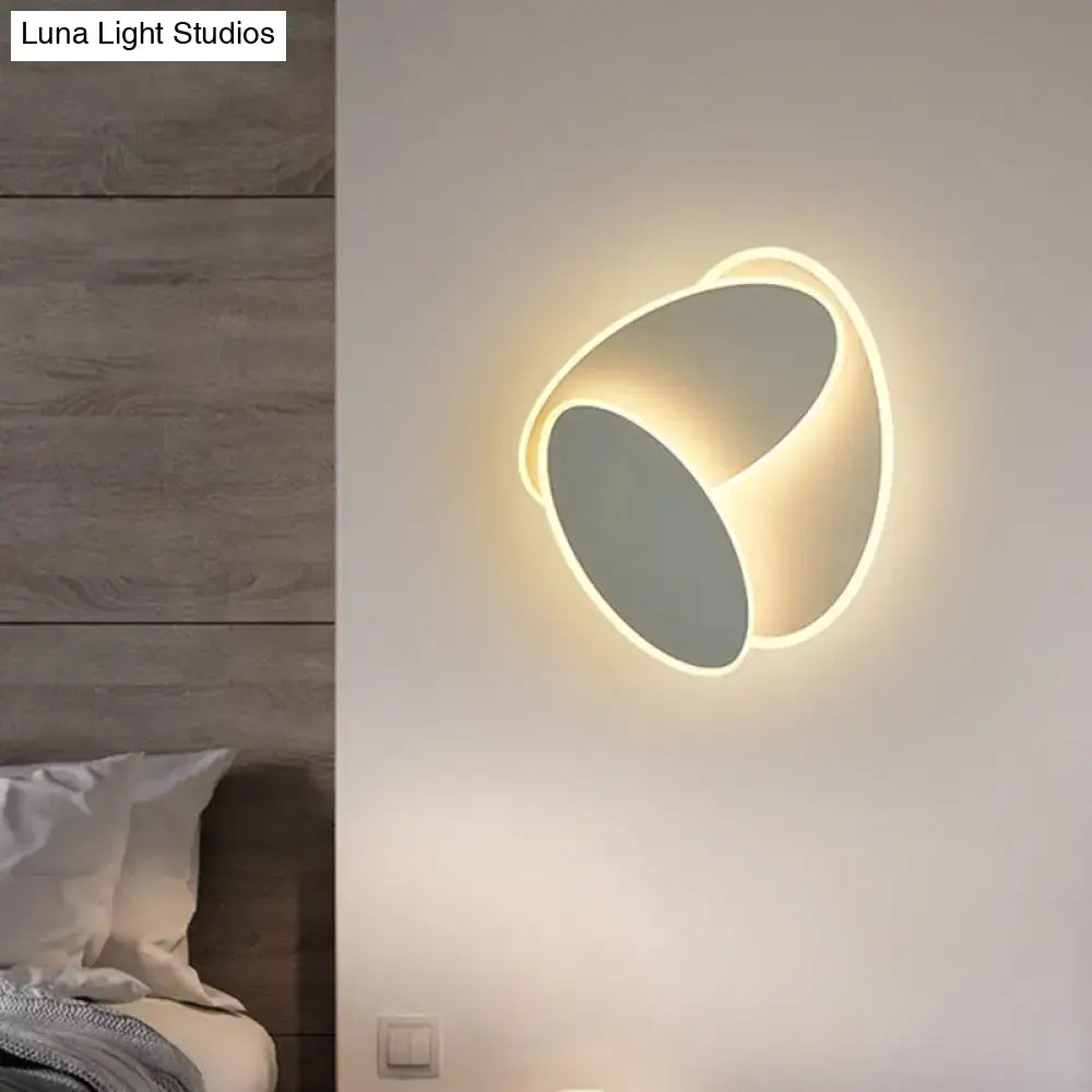 Modern black and white rotatable led wall light fixture with sleek curved design and matte gray finish for bedroom mirror