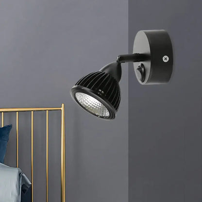 Modern black and white rotatable wall light with ribbed heat dissipation housing and adjustable arm LED spotlight