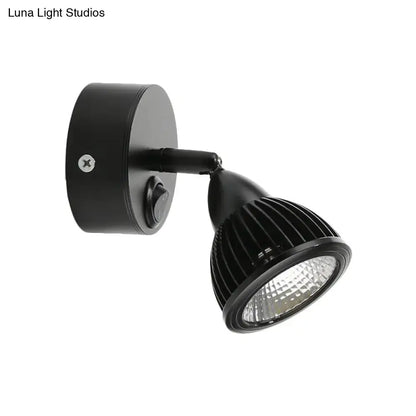 Modern black and white rotatable wall light with black matte adjustable spotlight and ribbed lens for bedroom LED lighting