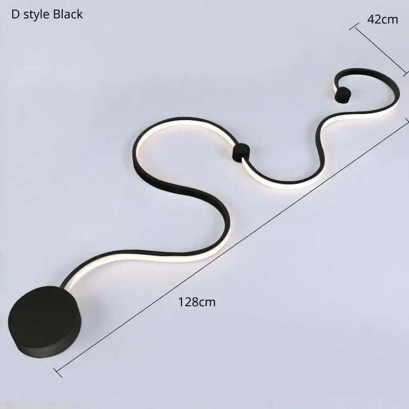 Modern black and white sculptural wall lamps featuring a black d-style led light with a contemporary acrylic curved design for decorbites bedroom decor