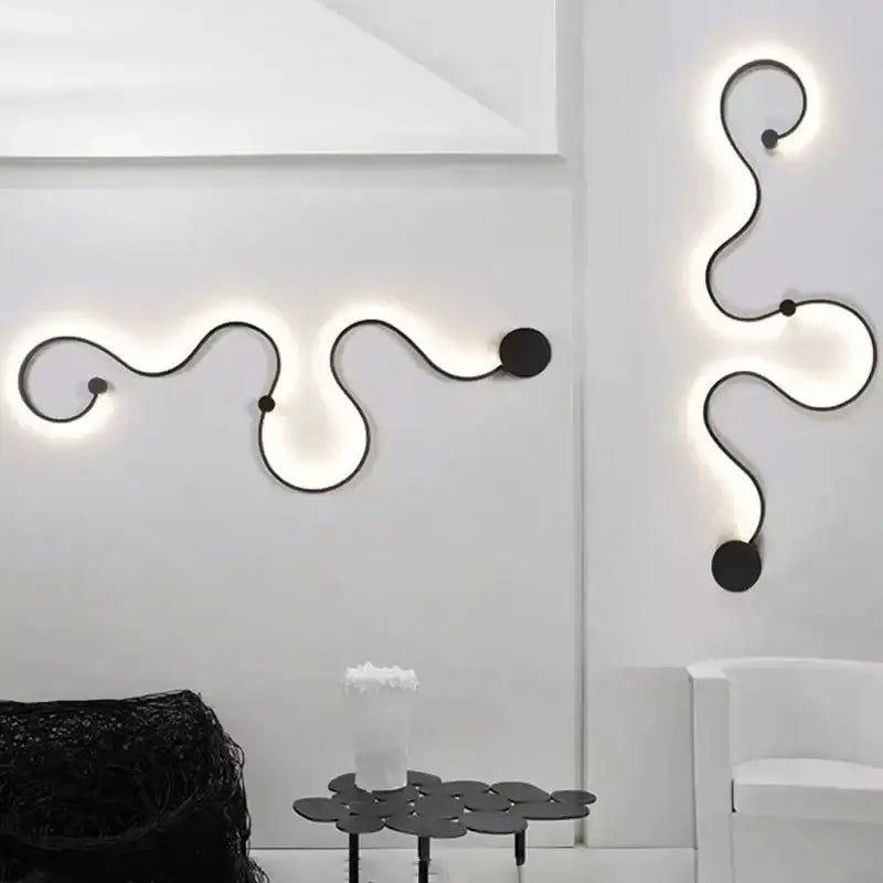 Modern black wrought iron wall lamps with glowing serpentine light trails for bedroom decorbites contemporary acrylic wall