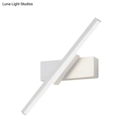 Modern black and white slim led wall sconce with sleek angular design and minimalist rectangular fixture for bedroom lighting
