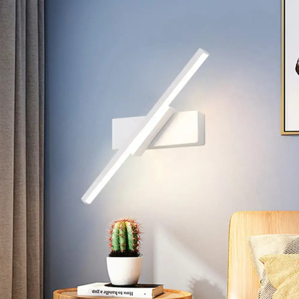 Modern white led wall sconce with sleek angular design in black and white slim style for bedroom linear lighting