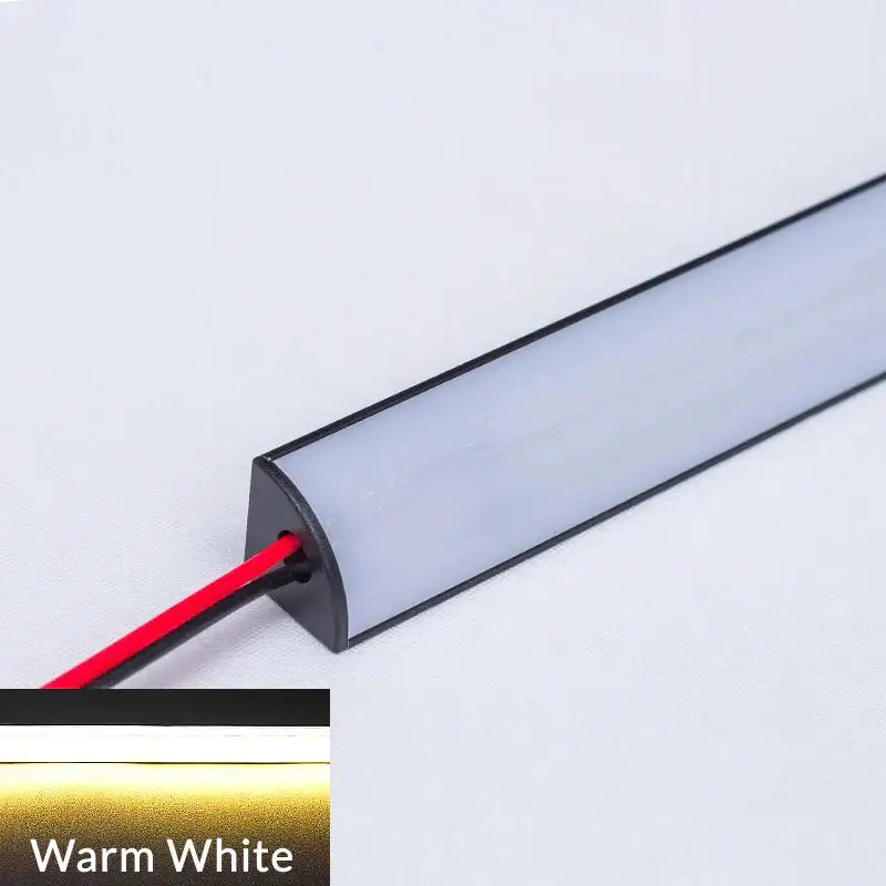 Modern black and white tube bar light featuring warm white led strip with black casing and red wiring decorbites led black