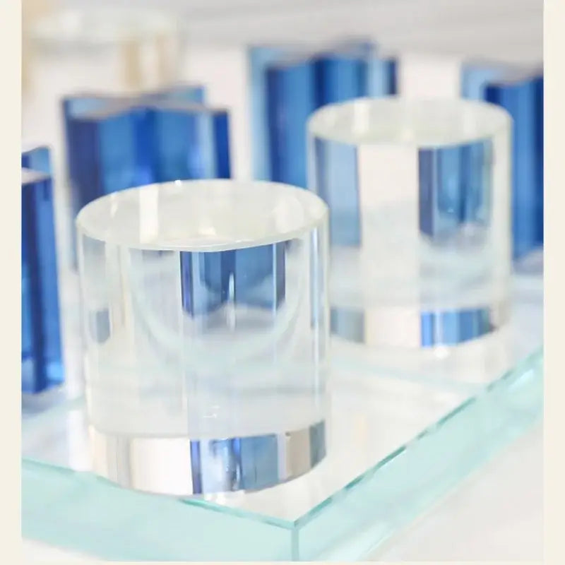 Clear cylindrical glassware with frosted base and blue accents from modern blue acrylic decorbites crystal chessboard set