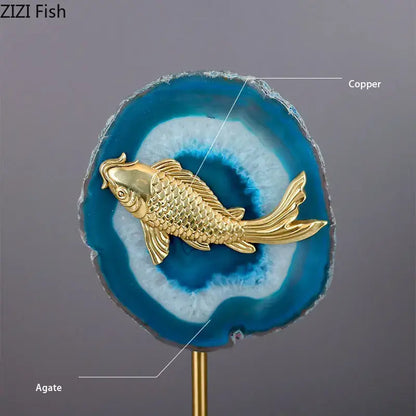 Modern blue agate and golden fish statue featuring a gold koi fish ornament on vibrant blue and white decorbites blue agate