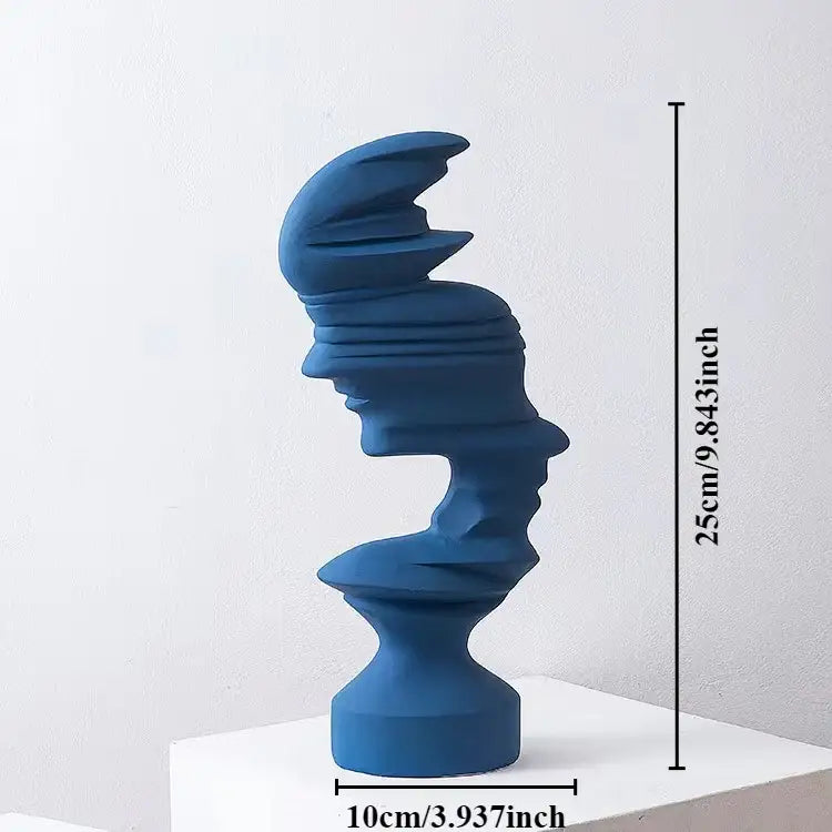 A sleek deep blue ceramic modern abstract human face sculpture for living room decor by decorbites