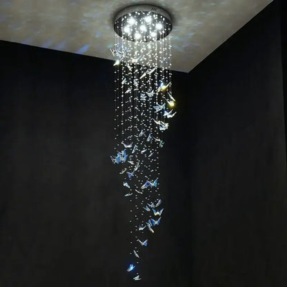 Modern blue and clear butterfly crystal chandelier with circular mount and cascading decorbites butterfly crystals lighting staircase