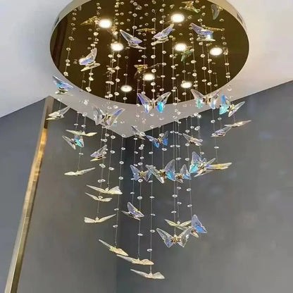 Modern blue and clear butterfly crystal chandelier featuring iridescent decorbites butterfly crystals on gold frame