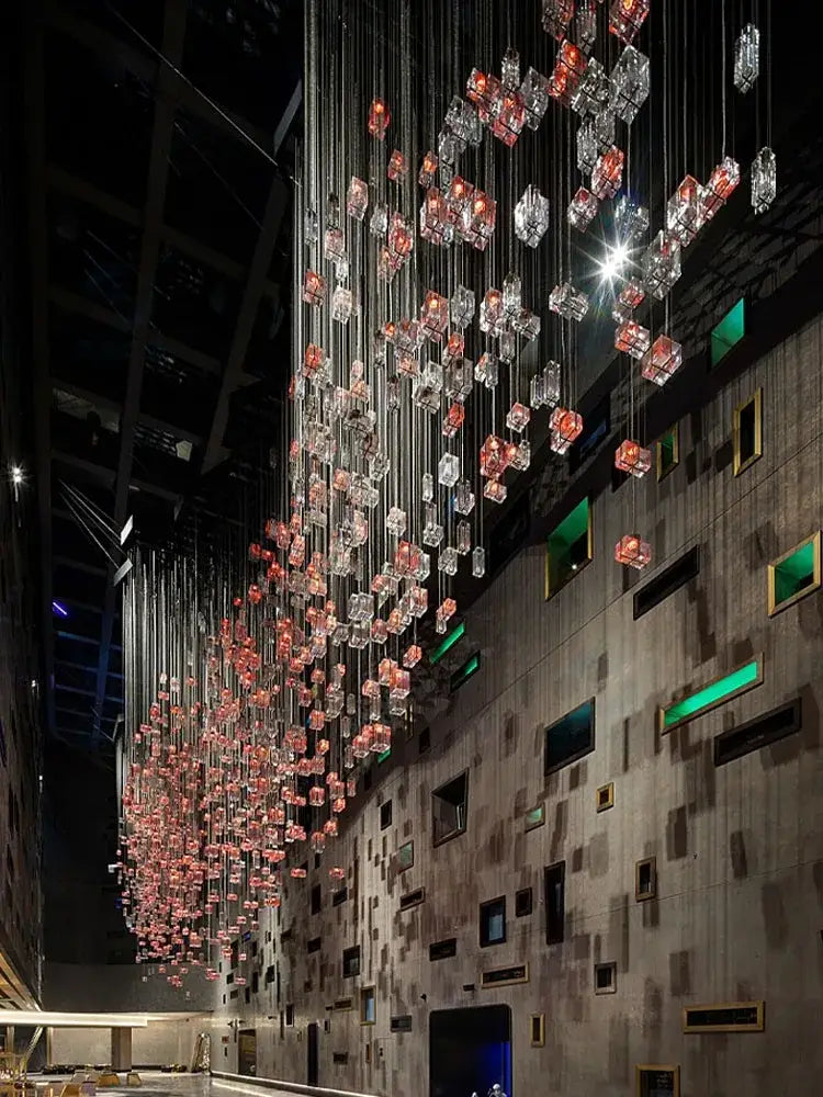 Modern blue and clear crystal cube pendant light featuring cascading transparent and rose-colored cubes for living room decorbites chandelier