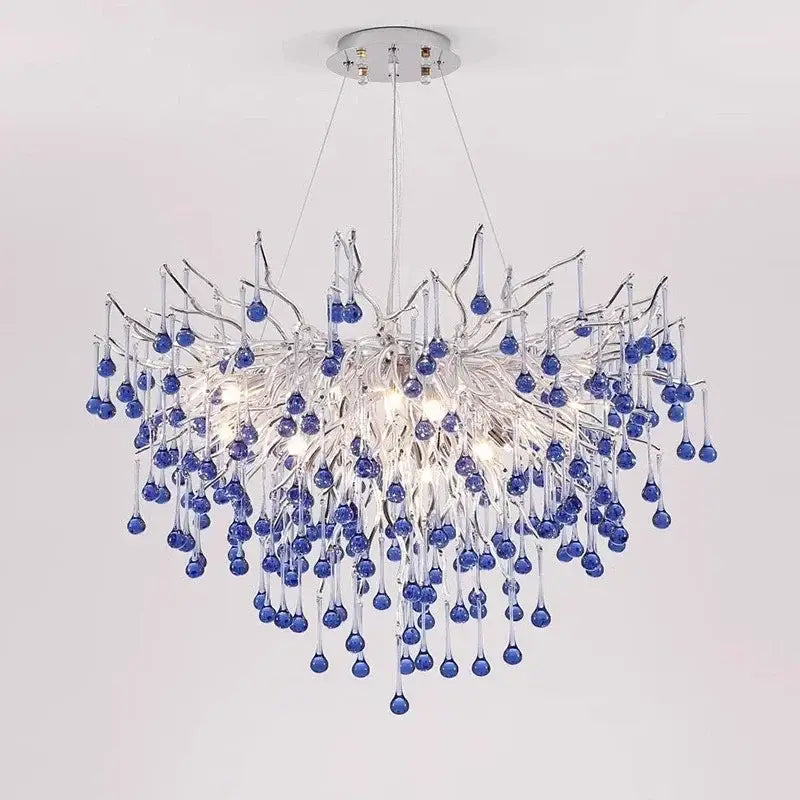 Modern blue crystal led pendant light with a chrome metal frame and dangling blue glass teardrop decorbites blue crystal
