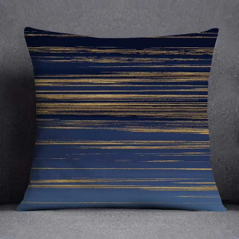 Modern blue geometric floral design pillowcase with navy blue fabric and horizontal gold foil streaks for living room decor