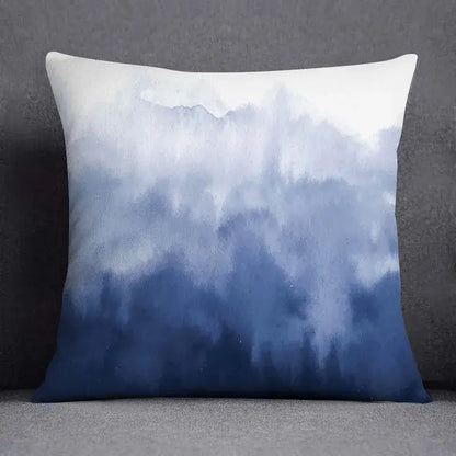 Modern blue geometric floral design square cushion with watercolor gradient from white to deep blue for living room