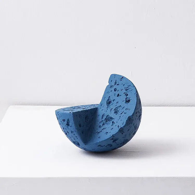 Modern blue geometric square sculpture stack featuring a textured porous concrete half-sphere for living room decorbites decor
