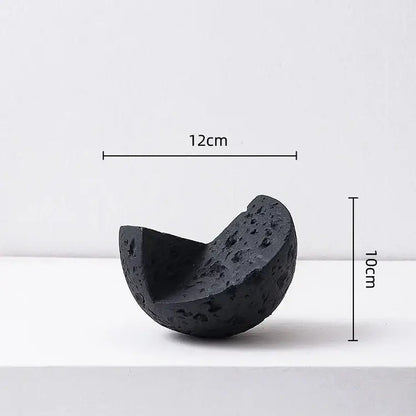 Black porous lava rock sculpture with curved half-spherical shape for decorbites geometric square sculpture stack decor