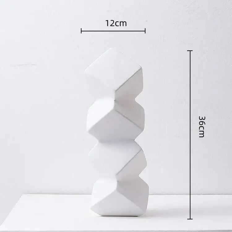 White ceramic sculpture stack with geometric square faceted forms for modern decorbites geometric square decor