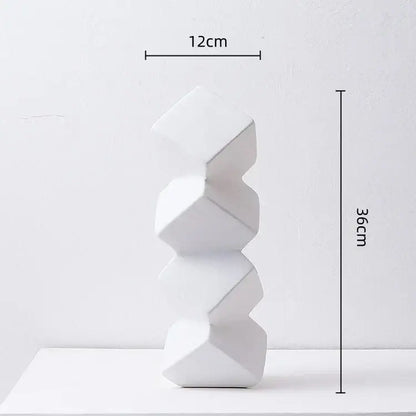 White ceramic sculpture stack with geometric square faceted forms for modern decorbites geometric square decor