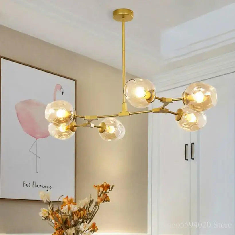 Modern blue glass black gold pendant light living room chandelier with gold-toned glass black gold globe bulbs decorbites glass black
