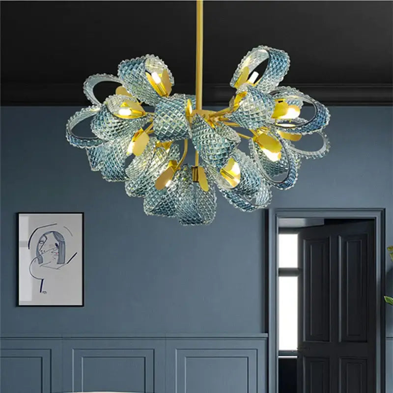 Modern blue glass led pendant lamps featuring delicate light blue glass and gold-toned accents for dining room decorbites