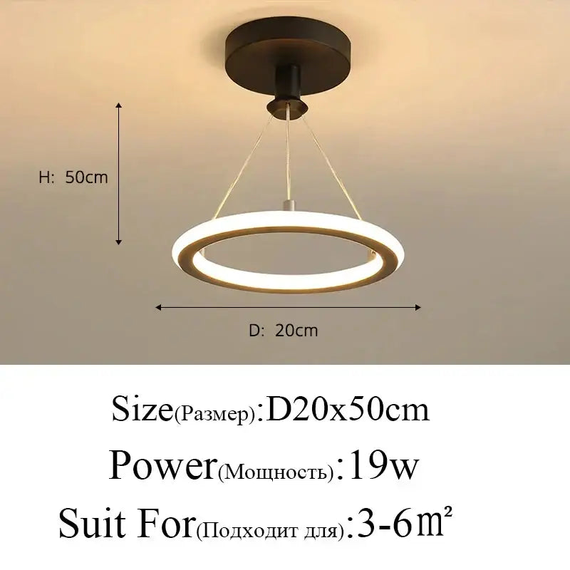 Modern blue star led pendant light featuring a minimalist ring-shaped design with warm white illumination and black base