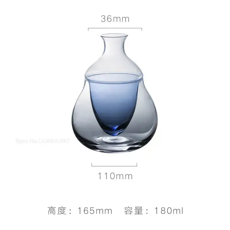 A sleek transparent glass wine pot with gradient blue interior and narrow neck, ideal as a modern pot ice jug