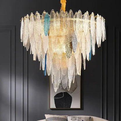Modern blue and white leaf pendant lights with cascading textured glass shades and decorbites gold metal chain frame