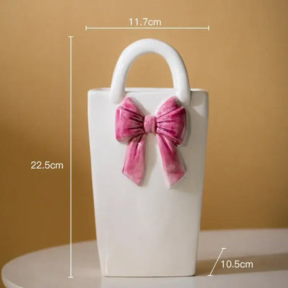 White ceramic vase handbag decor with pink bow and handle for living room by decorbites bowknot ceramic collection