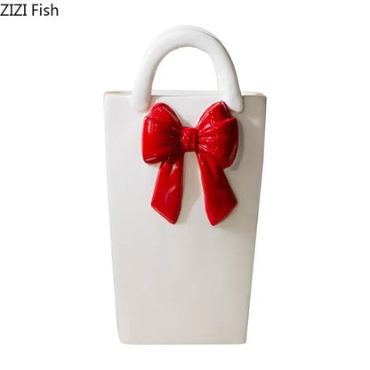 White ceramic ceramic vase handbag with glossy red bow and handle ideal for modern living room decorbites bowknot ceramic decor
