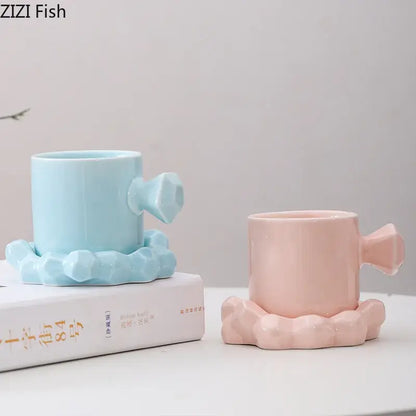 Modern bowknot decor porcelain cup set featuring pastel blue and pink mugs with faceted handles and cloud bases by decorbites bowknot decor