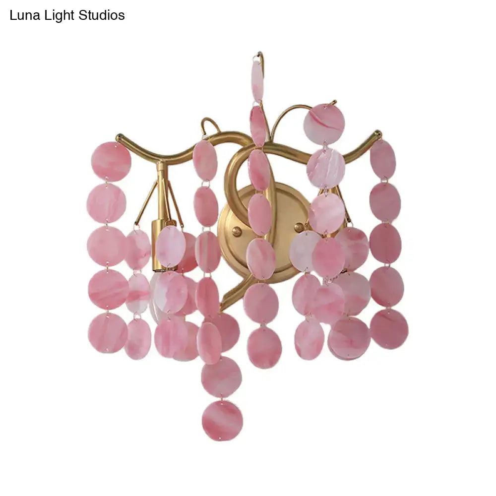 Modern branch design bedroom wall lamp with pink marble disc and gold-toned metal frame sconce