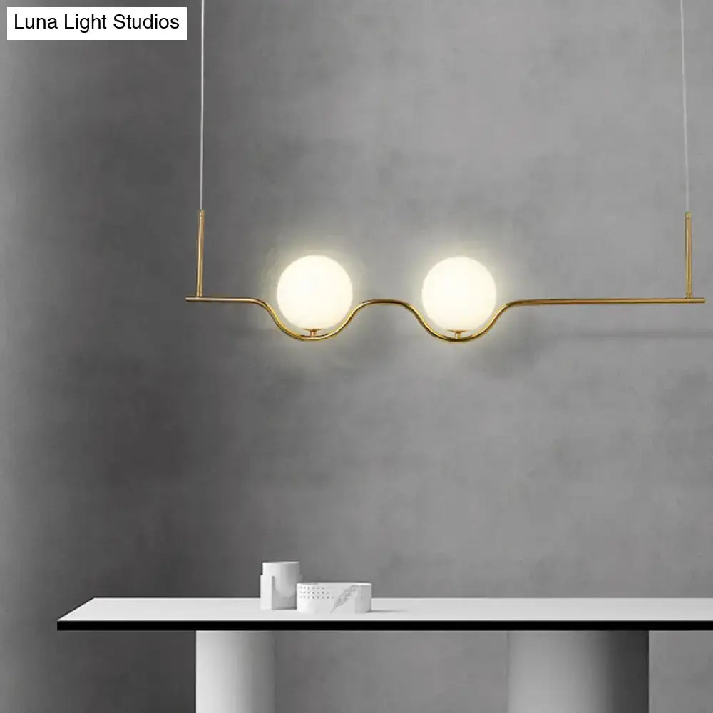 Decorbites modern brass 2-head island pendant ceiling light with gold-toned rods and white glass shade bulbs