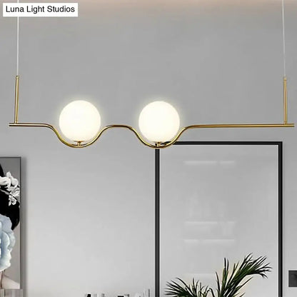 DecorBites modern brass 2-head pendant ceiling light with adjustable cord and white frosted glass shade spheres