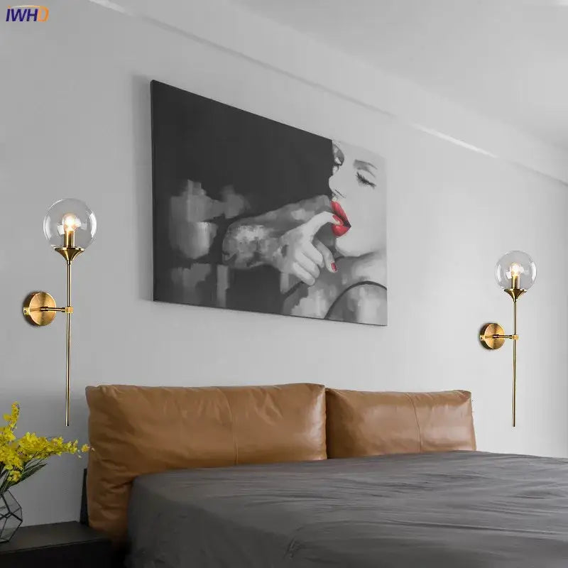 Modern brass and amber decorbites glass ball wall lamp with gold-toned sconces and clear glass globes for bedroom led wall lighting
