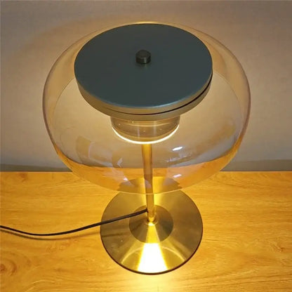 Modern brass and amber glass mushroom table lamp with translucent amber globe metallic gold base and teal shade for decorbites elegant mushroom decor
