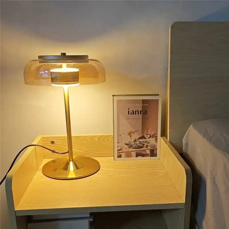 Modern brass and amber glass mushroom table lamp with gold metal base and translucent shade for warm bedroom light decorbites elegant mushroom glass