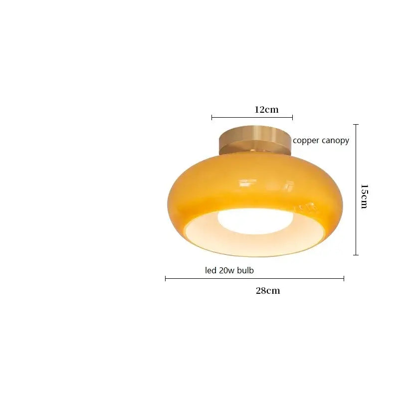 Modern brass and amber glass pendant light with a warm yellow glossy finish copper bauhaus led 20w bulb for kitchen lighting