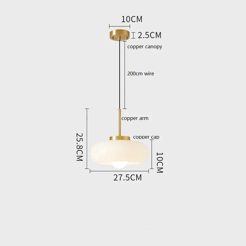 Modern brass and amber glass pendant light with frosted shade and polished copper bauhaus led hardware for kitchen lighting