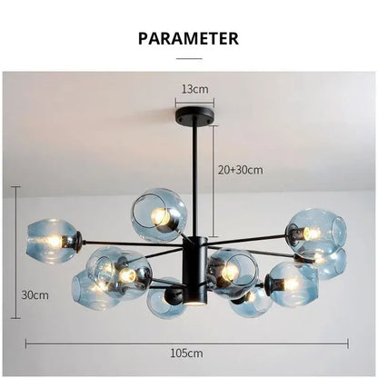 Modern brass and blue glass iron ball chandelier with black metal arms designed for dining room lighting