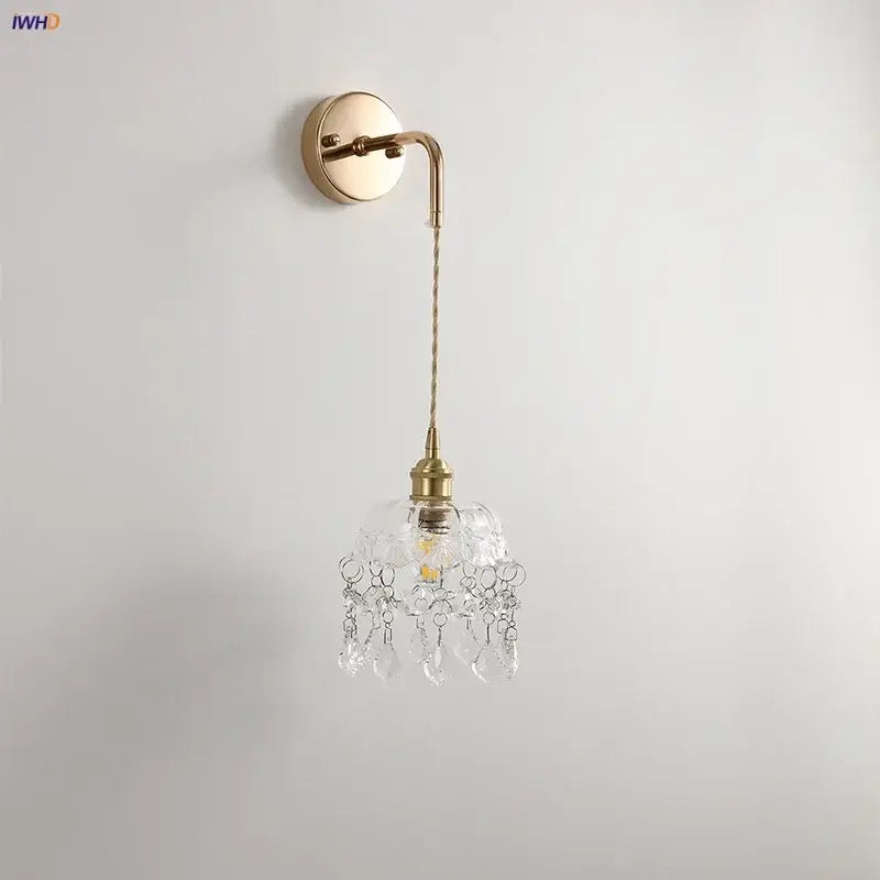Modern brass wall lamp with clear glass crystal chandelier shade and dangling faceted crystals for elegant decorbites clear glass decor