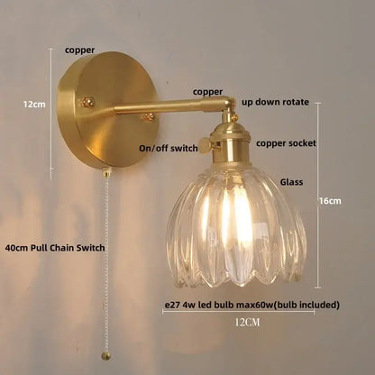 Modern brass and clear glass wall light with fluted shade and adjustable copper arm for bedroom decorbites clear glass design