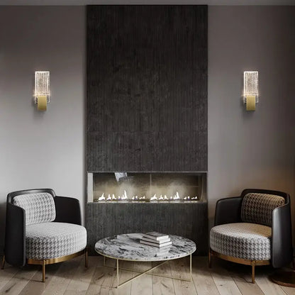 Modern brass and crystal wall light bedroom glass sconce paired with black and white houndstooth armchairs decorbites crystal wall light